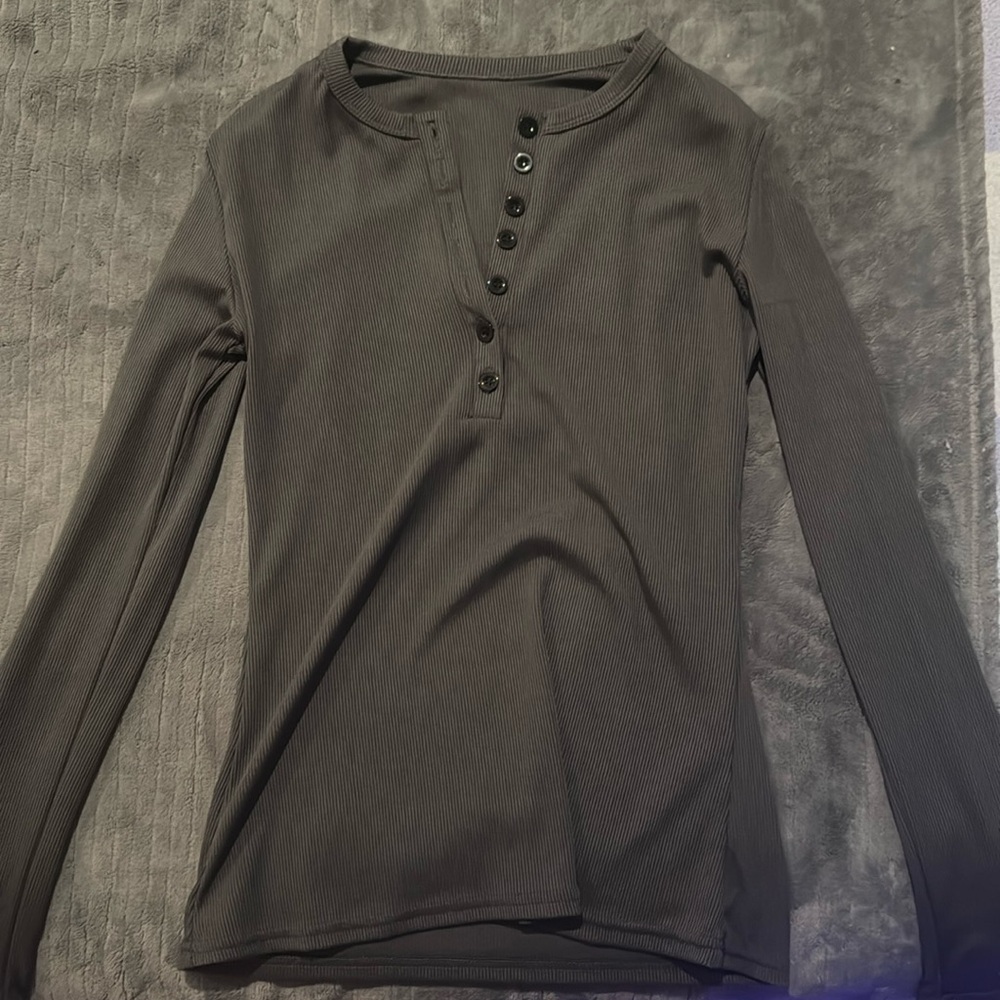 dark grey long sleeve button up shirt
